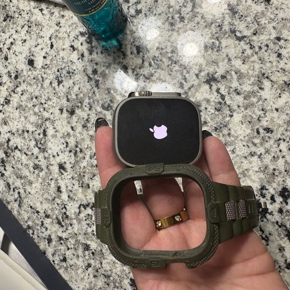 Apple Smartwatch with Black Face and Green Case